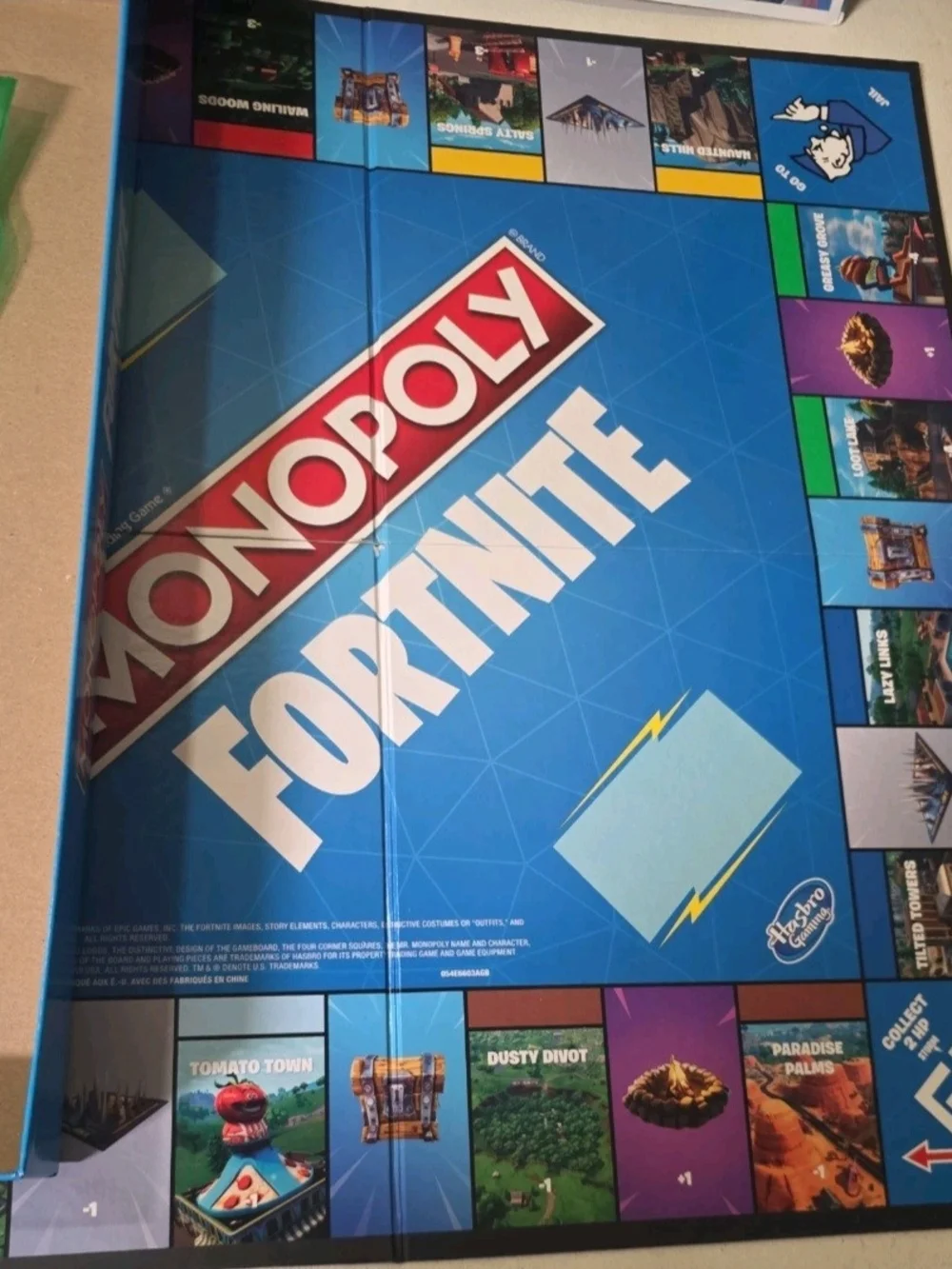 Hasbro Monopoly Fortnite Board Game - Blue, White, Red, Pink, Green
